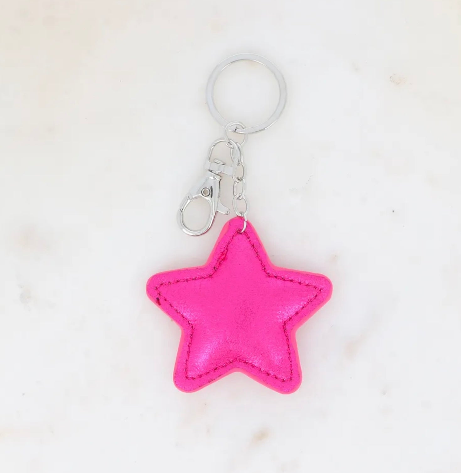 Porte clés étoiles fushia